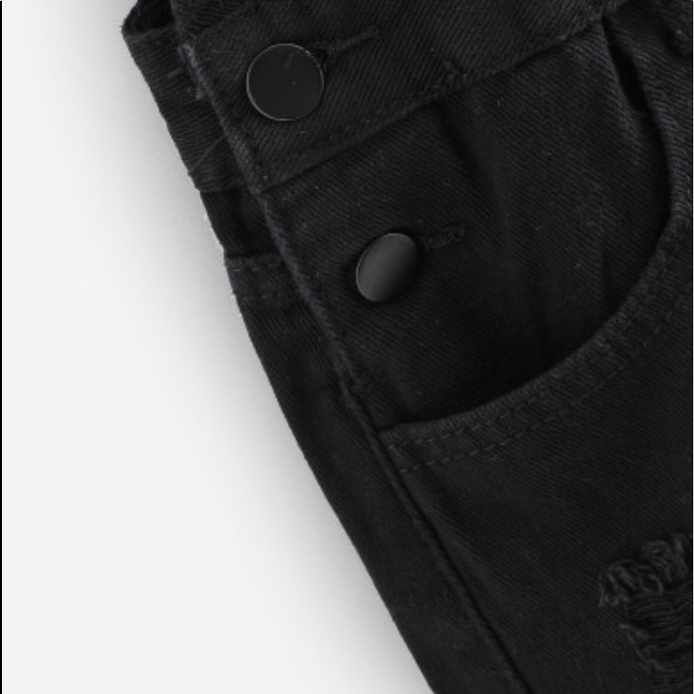 Black overalls.